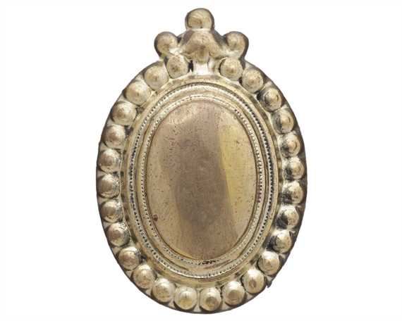 ORNAMENT LEAD FILLED BRASS OVAL BEADED EDGE 25MM